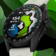 The Tag Heuer Connected Caliber E4 Golf Edition smartwatch, showing a golf course and metrics on-screen, against a green and black background.